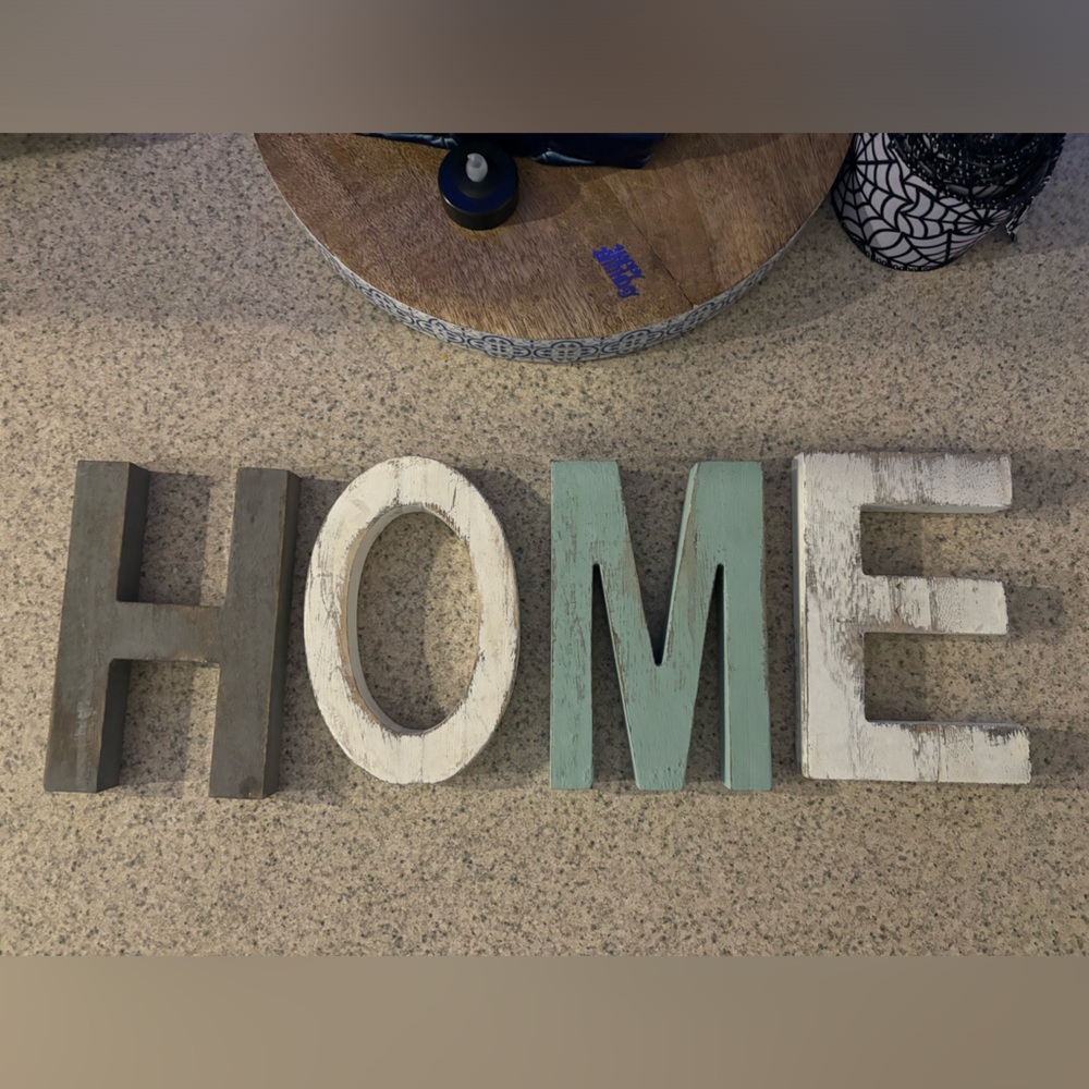 Wooden letters H O M E